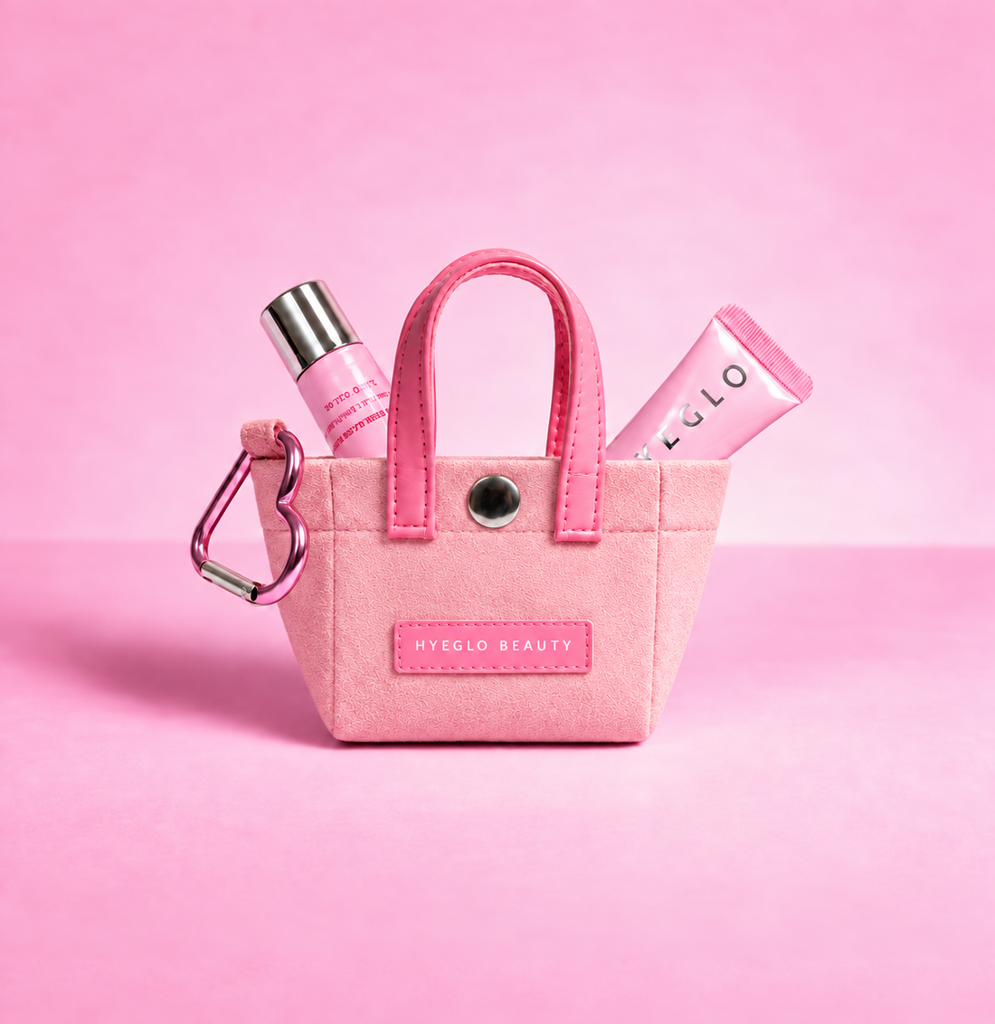 Pink Mini Charm Bag with a heart carabiner