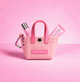 Pink Mini Charm Bag with a heart carabiner