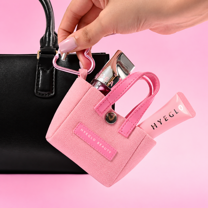 Pink Mini Charm Bag with a heart carabiner