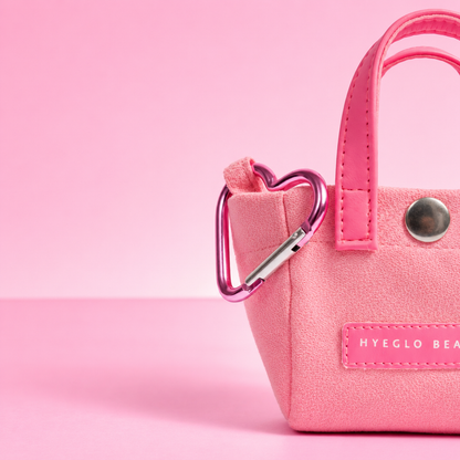 Pink Mini Charm Bag with a heart carabiner